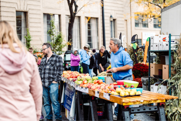 Vendor with fresh fruits